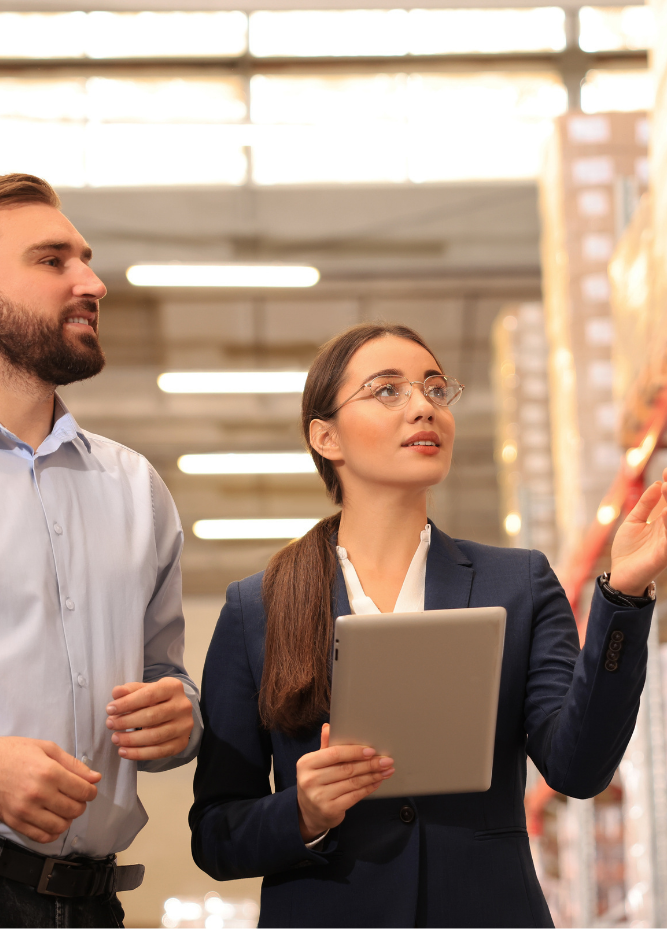 Professionals in warehouse logistics environment